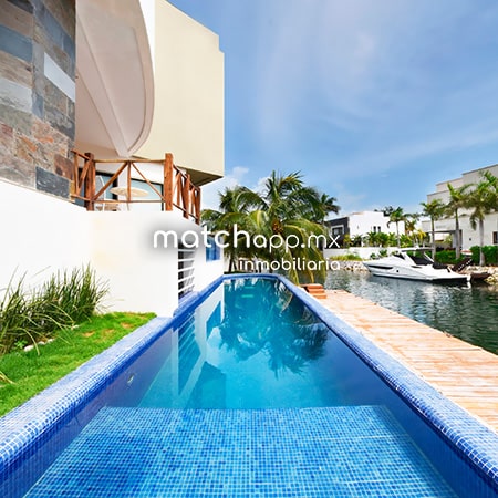 residencia en venta en Puerto Cancún 7 habitaciones, muelle para yates, estacionamiento subterraneo para 6 autos 512 m2 en venta por Carlos Esparza Ramón de matchapp.mx
